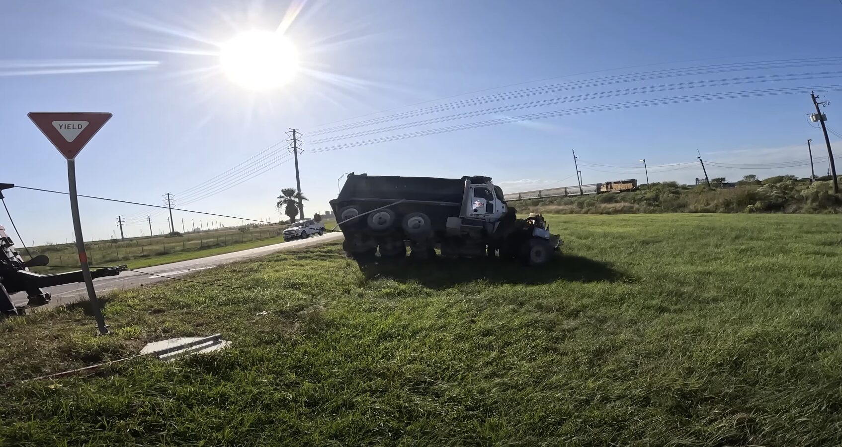 Professional heavy-duty towing service for commercial vehicles Heavy-duty towing truck recovering a large commercial vehicle in Maywood, CA